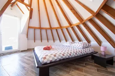 Un ou plusieurs lits dans un hébergement de l'établissement Moulin de Treflez I Plage et Calme