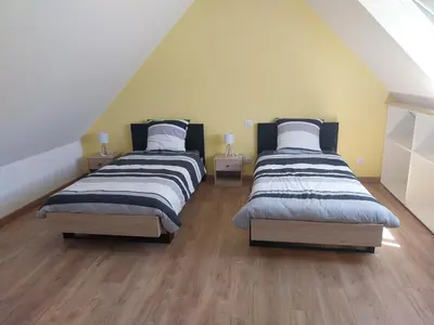 Un ou plusieurs lits dans un hébergement de l'établissement TyMel