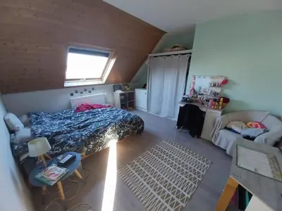 Un ou plusieurs lits dans un hébergement de l'établissement Maison très agréable