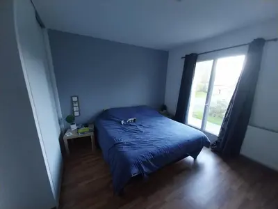 Un ou plusieurs lits dans un hébergement de l'établissement Maison très agréable
