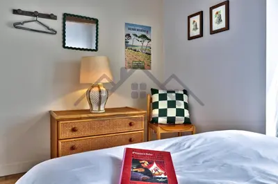 Un ou plusieurs lits dans un hébergement de l'établissement LocaLise - M6B - Ty pompon, - Maison de vacances dans le centre du Guilvinec - extérieur clos - wifi inclus - animaux bienvenus - à deux pas des plages et du port du Guilvinec