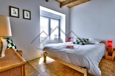 Un ou plusieurs lits dans un hébergement de l'établissement LocaLise - M6B - Ty pompon, - Maison de vacances dans le centre du Guilvinec - extérieur clos - wifi inclus - animaux bienvenus - à deux pas des plages et du port du Guilvinec