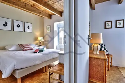 Un ou plusieurs lits dans un hébergement de l'établissement LocaLise - M6B - Ty pompon, - Maison de vacances dans le centre du Guilvinec - extérieur clos - wifi inclus - animaux bienvenus - à deux pas des plages et du port du Guilvinec
