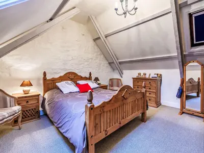 Un ou plusieurs lits dans un hébergement de l'établissement Holiday Home Maison de Langonnet by Interhome