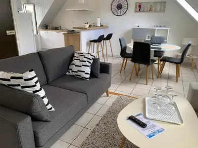 Coin salon dans l'établissement L'Ecume, T2 proche plage de Morgat