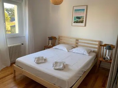 Un ou plusieurs lits dans un hébergement de l'établissement Maison à Morgat - 2 à 3 chambres - Terrasse - Jardin - Plage