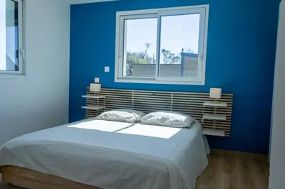 Un ou plusieurs lits dans un hébergement de l'établissement Ti Nevez - au calme - vue mer