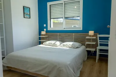Un ou plusieurs lits dans un hébergement de l'établissement Ti Nevez - au calme - vue mer