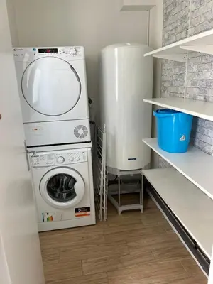 Cuisine ou kitchenette dans l'établissement Charmant appartement T3 avec terrasse en rez de jardin sur le Golf e L'Odet