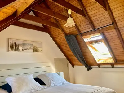 Un ou plusieurs lits dans un hébergement de l'établissement Benniel bihan maison de vacances à 5 minutes des plages de la baie de Douarnenez