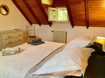 Un ou plusieurs lits dans un hébergement de l'établissement Benniel bihan maison de vacances à 5 minutes des plages de la baie de Douarnenez