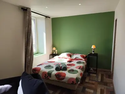 Un ou plusieurs lits dans un hébergement de l'établissement L'ibis City By Nid 'ouest