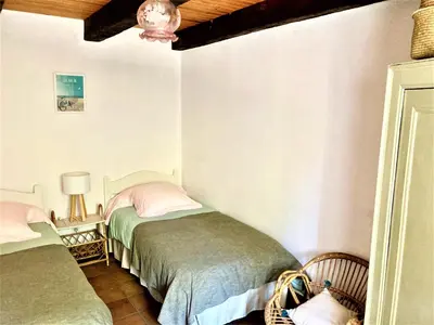 Un ou plusieurs lits dans un hébergement de l'établissement Benniel bras maison de vacances à 5 minutes des plages