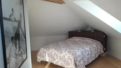 Un ou plusieurs lits dans un hébergement de l'établissement Grande maison sur propriété près de la plage de Morgat