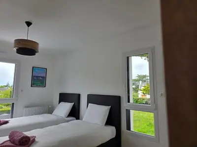 Un ou plusieurs lits dans un hébergement de l'établissement Villa Babalélé, Fouesnant