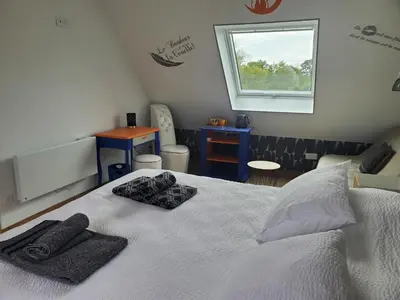 Un ou plusieurs lits dans un hébergement de l'établissement Chambre et table d'Hotes Manava Loretta