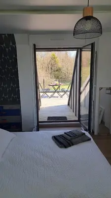 Un ou plusieurs lits dans un hébergement de l'établissement Chambre et table d'Hotes Manava Loretta