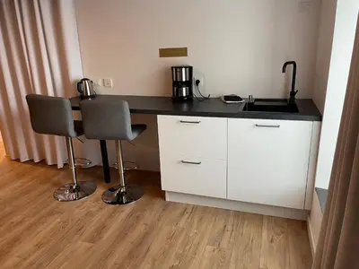 Cuisine ou kitchenette dans l'établissement Beau studio confortable pour 2 personnes Studio Roz