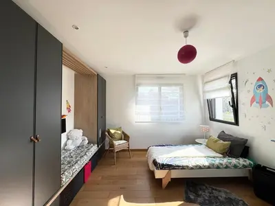 Un ou plusieurs lits dans un hébergement de l'établissement Belle maison spacieuse et jardin paysager, Gouesnac'h