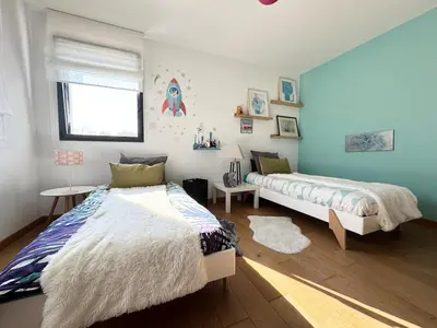 Un ou plusieurs lits dans un hébergement de l'établissement Belle maison spacieuse et jardin paysager, Gouesnac'h