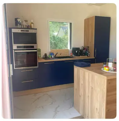 Cuisine ou kitchenette dans l'établissement Maison paisible