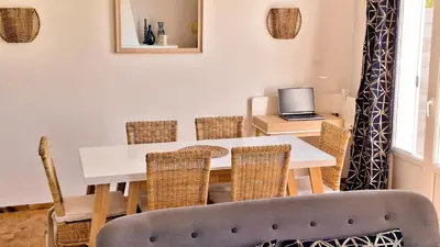 Coin salon dans l'établissement Face à l'océan accès direct à la plage, la maison des dunes