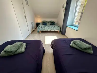 Un ou plusieurs lits dans un hébergement de l'établissement Charming seaside family home - sleeps 8