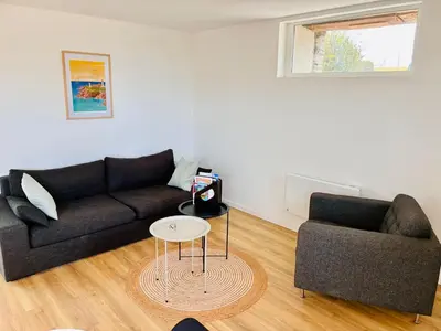 Coin salon dans l'établissement La longère des plages