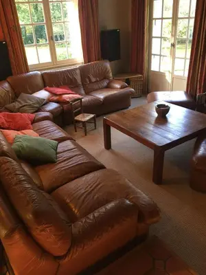 Coin salon dans l'établissement Morlaix - Maison au milieu des bois