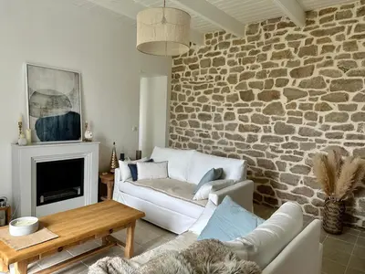 Coin salon dans l'établissement Maison de charme 3 chambres plage de Lodonnec