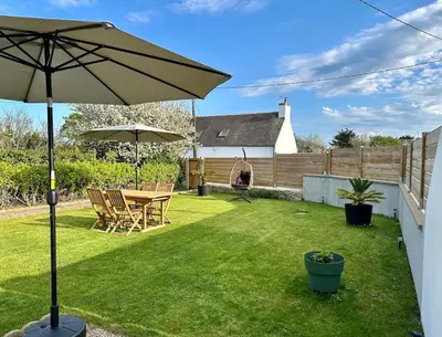 Jardin de l'établissement Maison de charme 3 chambres plage de Lodonnec