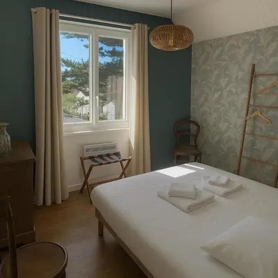 Un ou plusieurs lits dans un hébergement de l'établissement Maison à 2 kms de la Plage