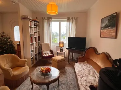 Coin salon dans l'établissement Maison à 2 kms de la Plage