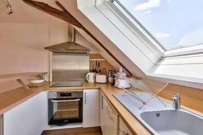 Cuisine ou kitchenette dans l'établissement Bright duplex St Mathieu - Rooftop view