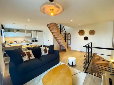 Coin salon dans l'établissement Charmant Duplex Plougonvelin