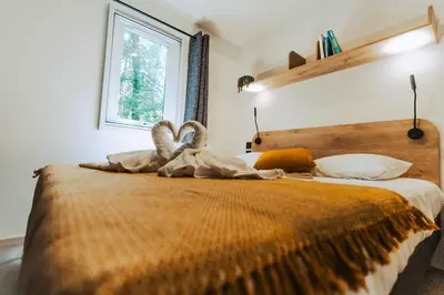Un ou plusieurs lits dans un hébergement de l'établissement Camping Baie de Saint Pol