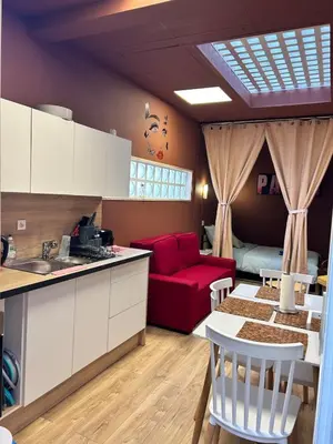 Cuisine ou kitchenette dans l'établissement Charmant appartement Havana