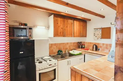 Cuisine ou kitchenette dans l'établissement Cottage Batz - Moulin de Kerellec