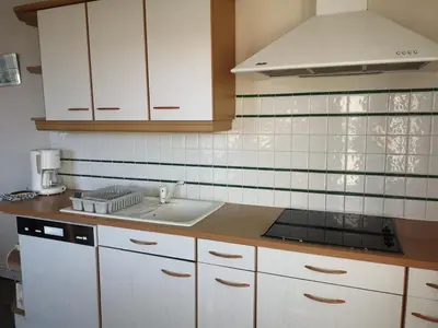 Cuisine ou kitchenette dans l'établissement appartement 3 chambres, plage à 400 m