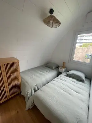Un ou plusieurs lits dans un hébergement de l'établissement Ecolodge