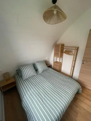 Un ou plusieurs lits dans un hébergement de l'établissement Ecolodge