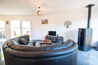 Coin salon dans l'établissement Milin Avel I 6 personnes & plage