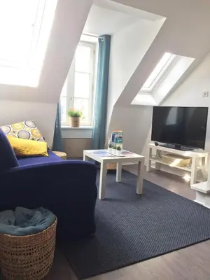 Télévision ou salle de divertissement dans l'établissement El pisito Quimperois duplex 2 chambres coeur de ville
