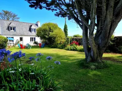Jardin de l'établissement Maison à quelques mètres de la mer