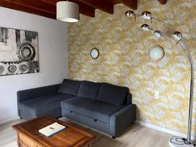 Coin salon dans l'établissement Maison à quelques mètres de la mer