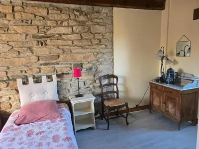 Un ou plusieurs lits dans un hébergement de l'établissement Authentique maison de caractère à Ploumoguer