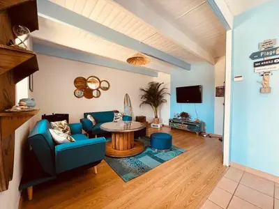 Télévision ou salle de divertissement dans l'établissement Gîte Ty Mamm Gozh