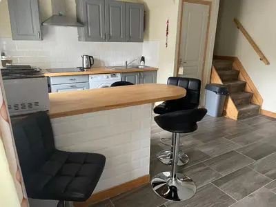Cuisine ou kitchenette dans l'établissement St Thois