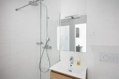Salle de bains dans l'établissement Le Moulin Blan