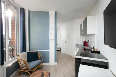 Cuisine ou kitchenette dans l'établissement Le Moulin Blan